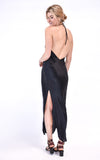 Bias cut, low back, adjustable strap slip dress in black silk. Beautiful for an evening event, wedding, or chic daytime look. Cut to fit slightly snuggly through hips to show off your curves. If you prefer a looser fit, we suggest that you size up! This item is also available as a custom order!